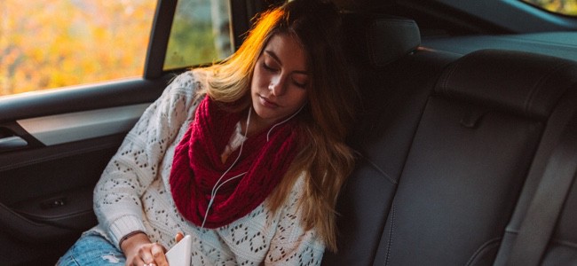Backseat-Rider-Leaning-Against-Door