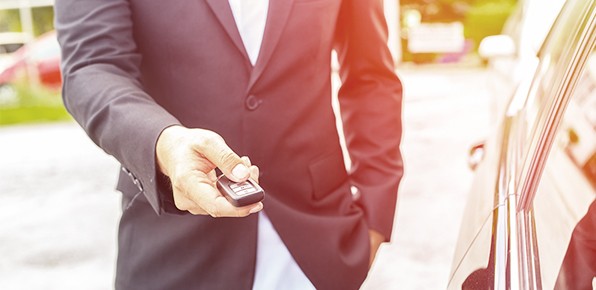 Man-Holding-Car-Remote